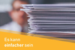 Papierstapel mit Hinweis auf einfachere Lösung